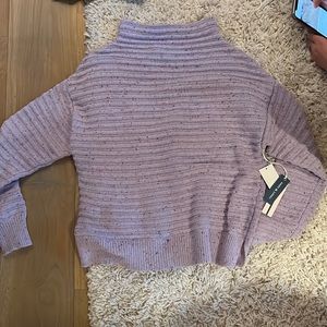 Purple sweater with small turtle neck some spot designs never worn